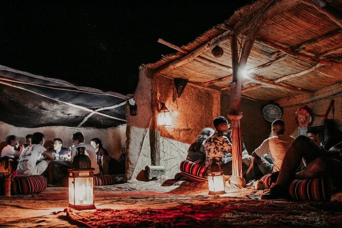 Agafay Desert Camel Ride from Marrakech with Dinner & Live Music - Dinner in the haima after dark