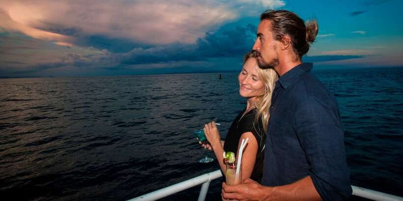 Bali/Benoa: Sunset Dinner Cruise with Show and Live Music - What the catamaran offers during the cruise