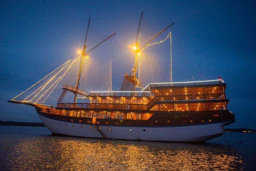 Bali Phinisi Cruise: Sunset Dinner with Live Music & Buffet - Boarding the Phinisi at Benoa Harbor