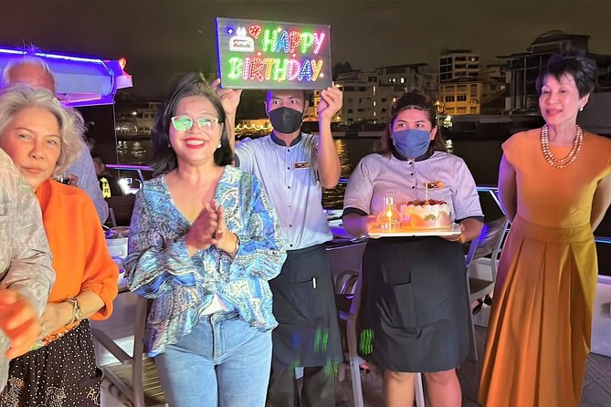 Bangkok Dinner Cruise with Intl Buffet, Live Music & Hotel Pickup - Reading Bangkok’s landmarks from the river