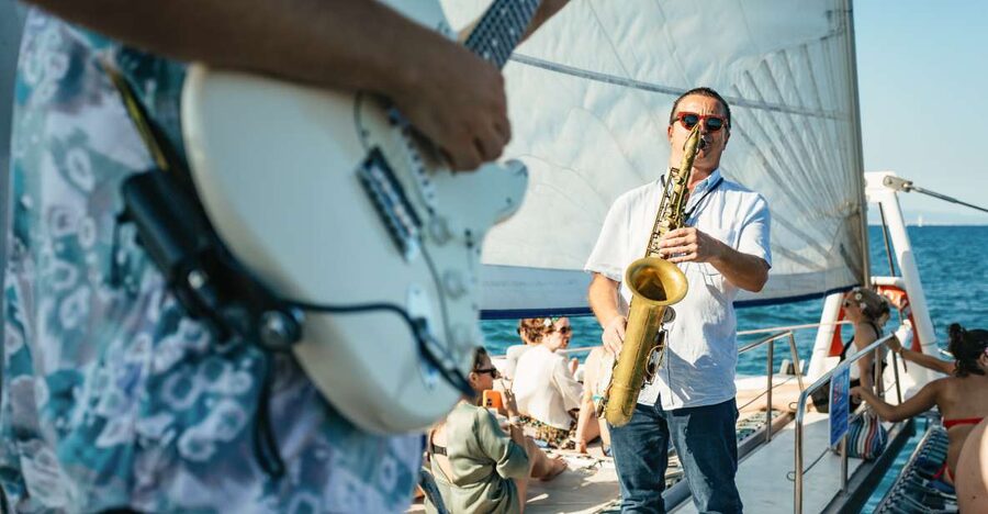 Barcelona: Sunset Catamaran Cruise with Live Music - The net area, seats, and the feel of the ride