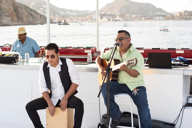 Cabo Sunset Dinner Cruise with Live Music & Open Bar on Cabo Wave - Lovers Beach at Sunset