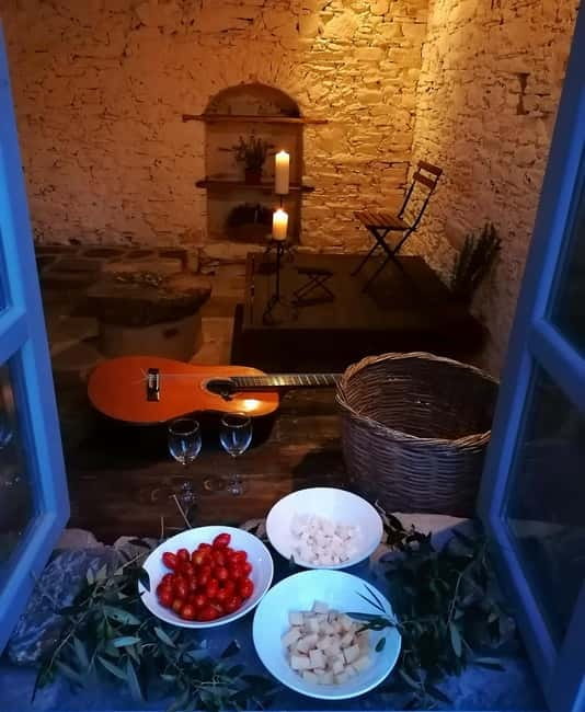 Classical guitar concert in a historic olive press - Listening to Nikos Karavias play
