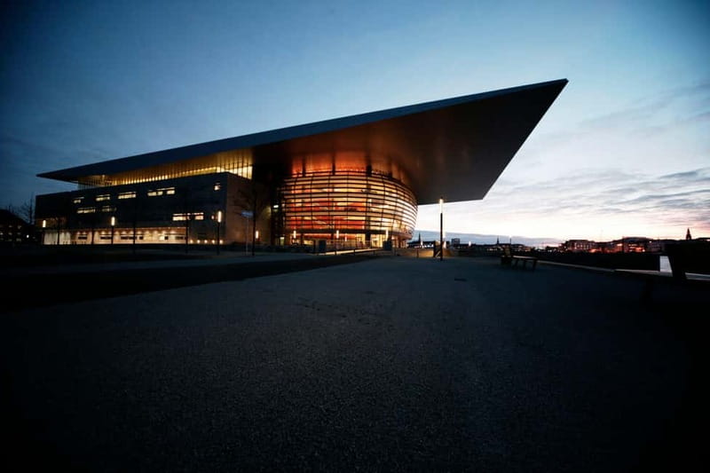 Copenhagen: The Opera House Guided Tour - Inside the auditorium: gilded details and glowing wood