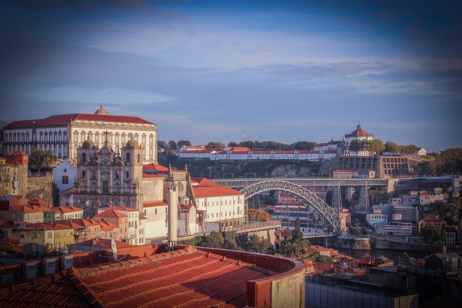 Fado Dinner Show and Night Lights Tour in Porto - Sitting down for Portuguese dinner and Fado