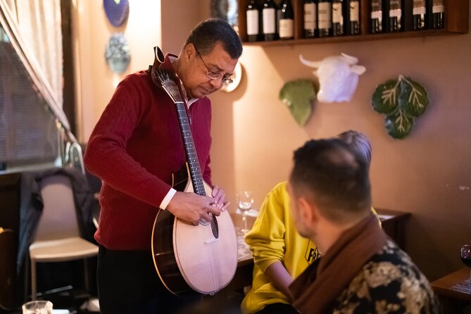 Fado Musical Experience with Portuguese Wine & Appetizers - Portuguese appetizers and a glass of Port