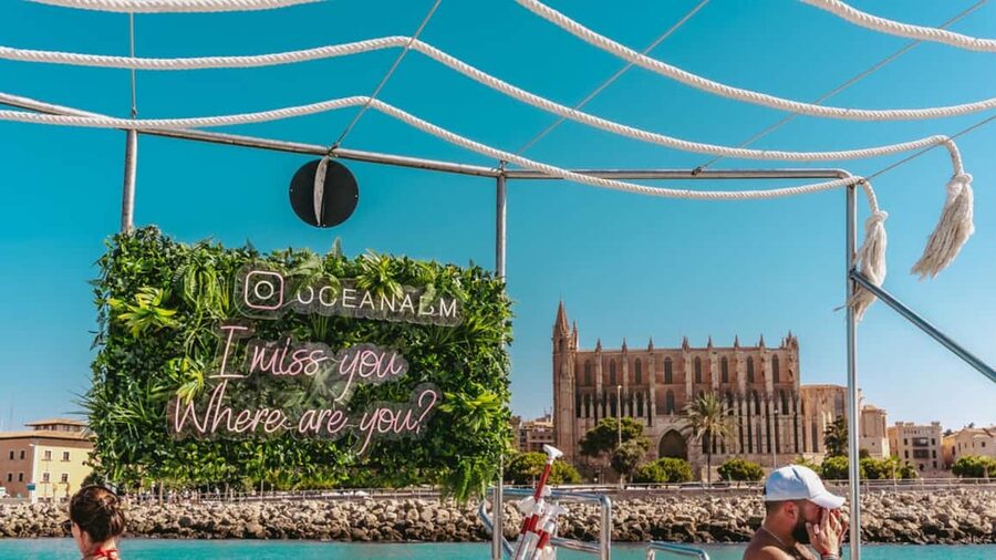 From Magaluf: Palma Bay Sightseeing Cruise with Live Music - Palma Cathedral and the waterfront approach