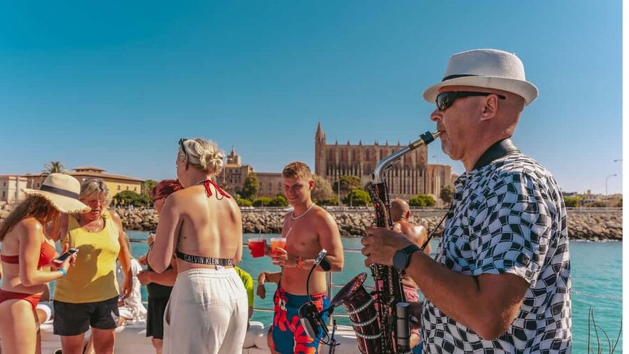 From Magaluf: Palma Bay Sightseeing Cruise with Live Music - The swimming stop in a sheltered cove