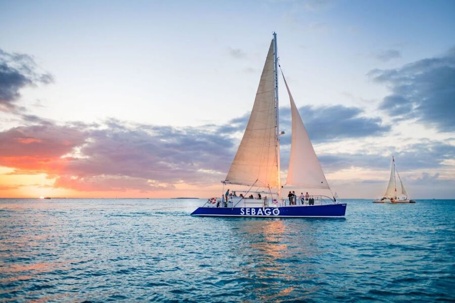 Key West: 2-Hour Sunset Sail with Live Music - The first views: seaport, waterfront activity, and open water