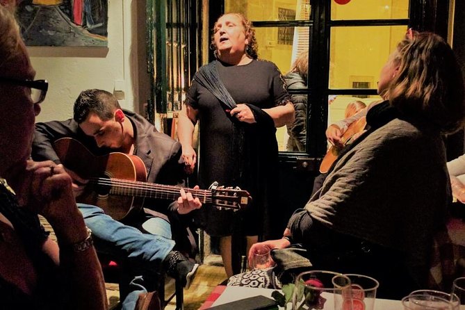 Lisbon Fado Experience: Walking Tour, Dinner and Live Music Show - Dinner at a traditional Fado house