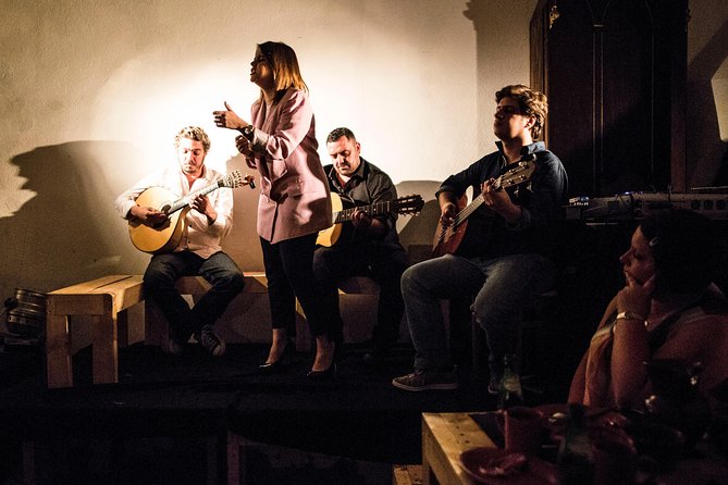 Lisbon Food Tour with 3 Stops and Fado Show Performance - Stop one: a bifana and a drink in Alfama