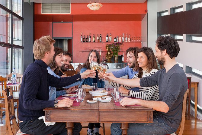 Lisbon Food Tour with 3 Stops and Fado Show Performance - Stop two: Portuguese wine, cheese, and petiscos