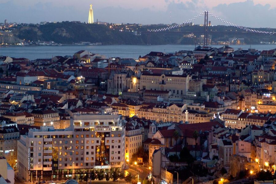 Lisbon: Half-Day Night Group Tour w/ Fado Dinner Show - Our Lady of the Mount after dark