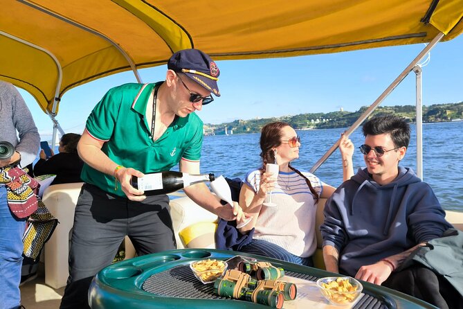 Lisbon Sunset Experience: Cruise, Wine and Live Music by the Capt - Sailing beneath the 25 de Abril Bridge
