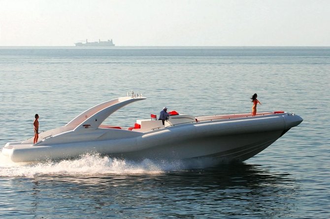 Luxury Opera 60 Whale & Dolphin Watching Experience - Boarding the Opera 60 at Puerto Colón