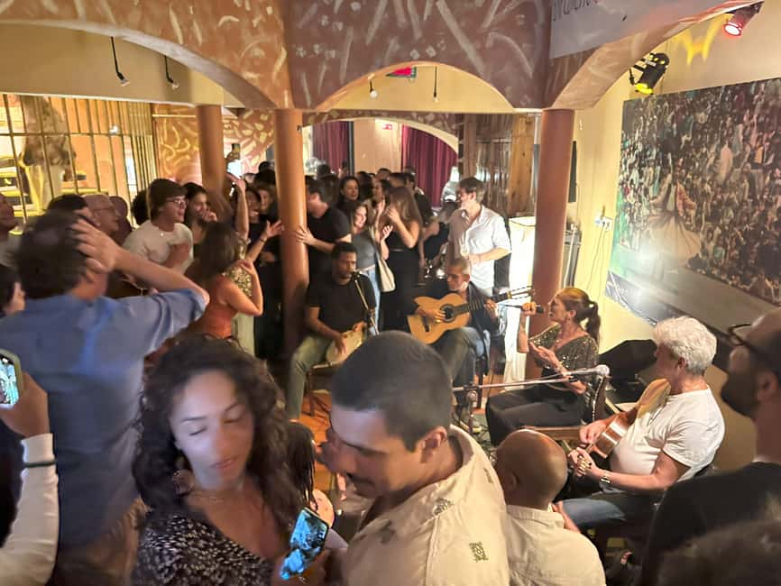 Multicultural Lisbon: Hidden Stories, Art, Food & Live Music - Graça, street art, and the climb to the view