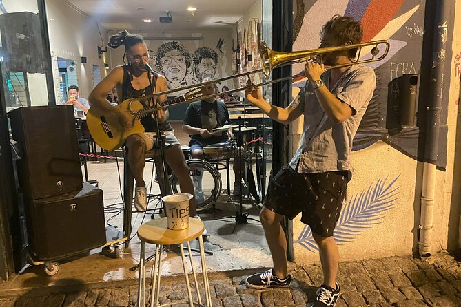 Multicultural Lisbon Walk: Food Tastings, Stories & Live Music - Walking through Mouraria, Alfama, and the castle hill