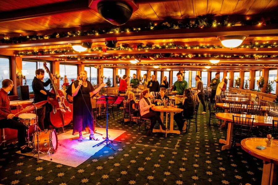 NYC: Holiday Yacht Cruise with Jazz, Cocoa & Carols - Ellis Island and the return toward Manhattan