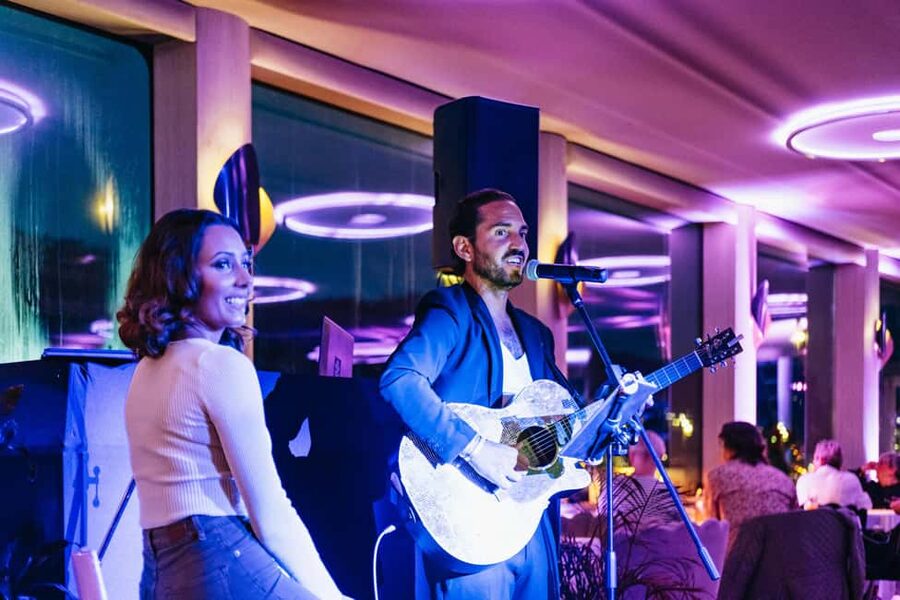 Paris: Gourmet Dinner Cruise on Seine River with Live Music - A polished boat with a party after dinner