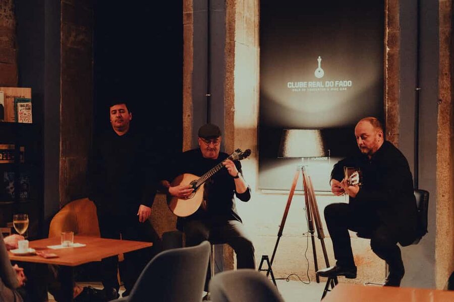 Porto: Fado Live Music, Wine & Cultural Introduction - Entering Clube Real do Fado near Clérigos Tower