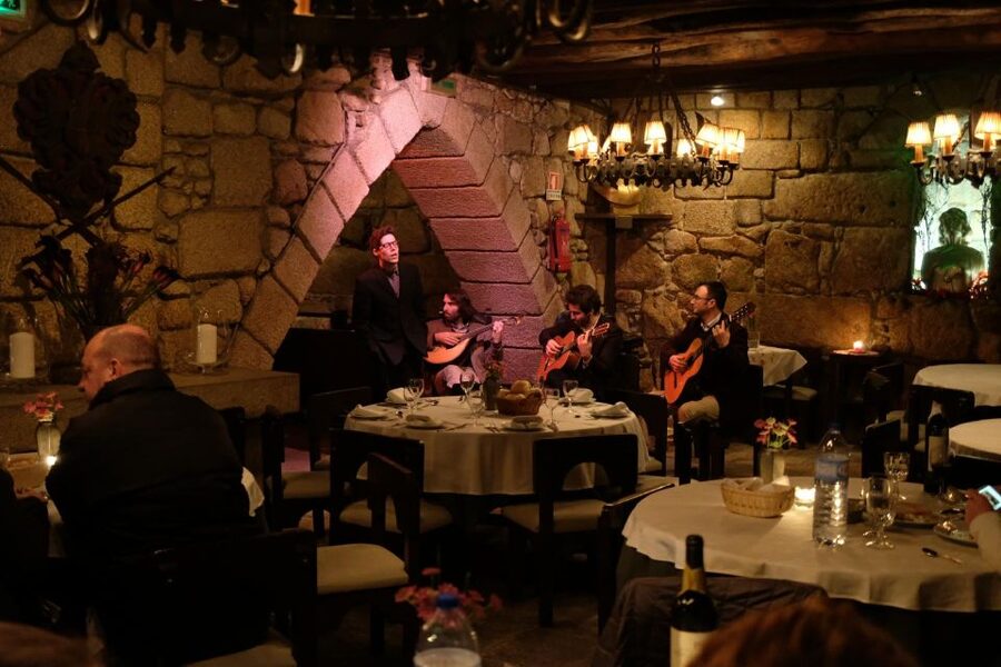 Porto Moonlight Walk & Fado Dinner - Starting beside the fountain at Praça de Gomes Teixeira