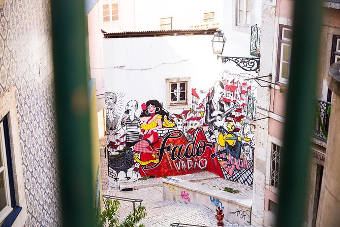 Private Tour: Lisbon Sunset Walking Tour with Fado Show and Dinner - Portas do Sol and nighttime Alfama
