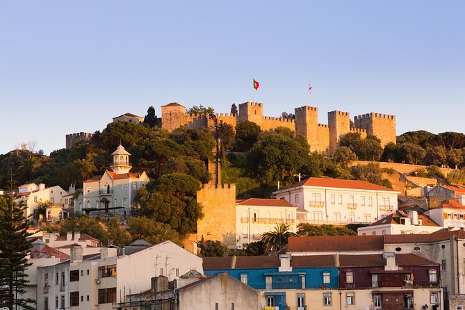 Private Tour: Lisbon Sunset Walking Tour with Fado Show and Dinner - The Fado dinner: music, food, and atmosphere