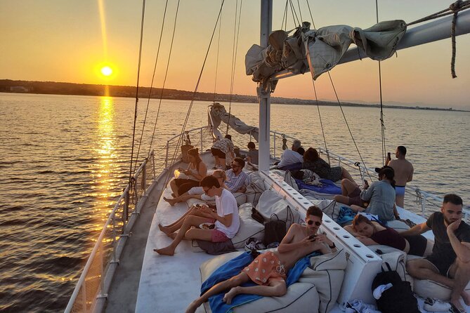 Rhodes Exclusive Sunset tour Cocktail Open bar Gourmet Live Music - Leaving Mandraki beside the old harbor