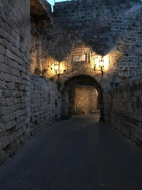 Rhodes: Guided Rhodes City By Night with Live Music & Dinner - Dinner, dessert, and live Greek music