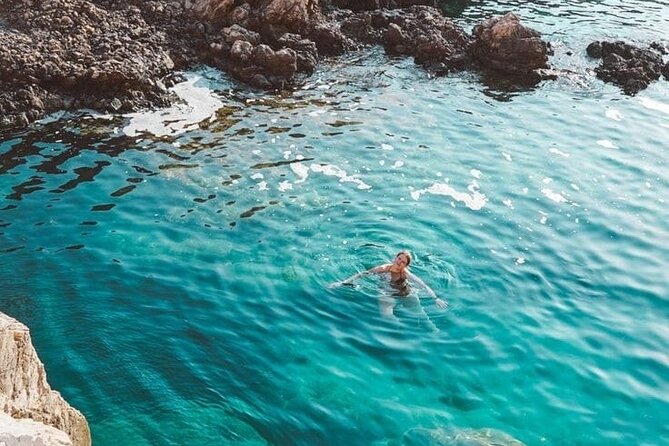 Rhodes Sunset Cruise - Swim and Dine w/ Live Music & Sunset! - Kallithea Springs: a short swim with a beautiful setting