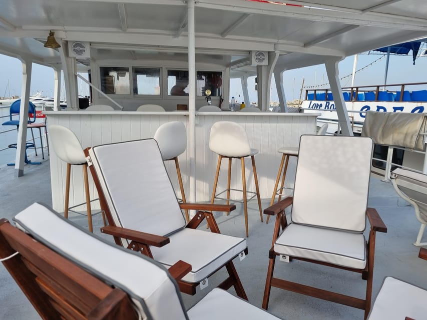 Rhodes: Sunset Cruise with Live Music, Wine & Greek Buffet - A Greek buffet with wine on deck