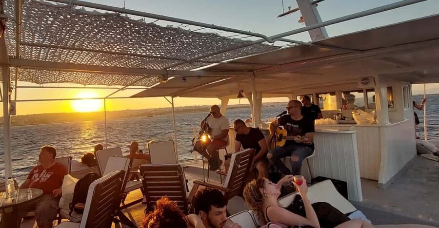 Rhodes: Sunset Cruise with Live Music, Wine & Greek Buffet - Live guitar music on the way back