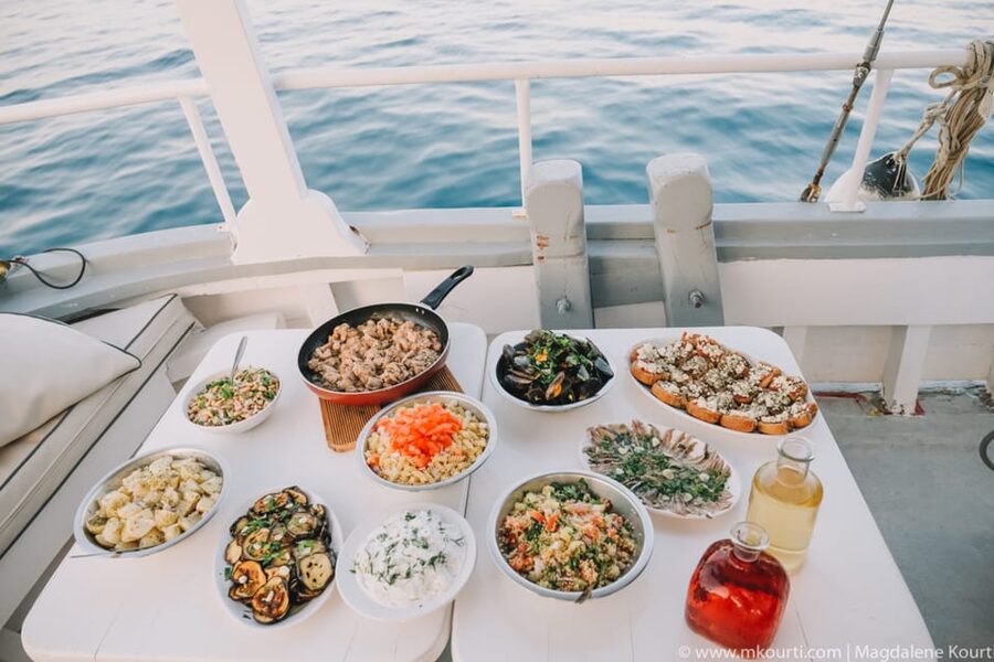 Rhodes: Sunset Cruise with Live Music, Wine & Greek Buffet - Who should book this Rhodes cruise?