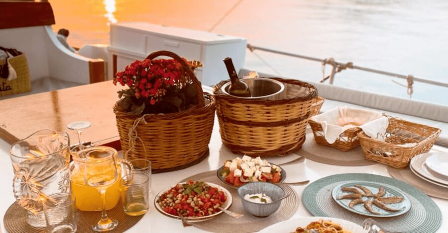 Rhodes: Sunset Cruise with Open Bar, Dinner, & Live Music - What to bring for a comfortable evening