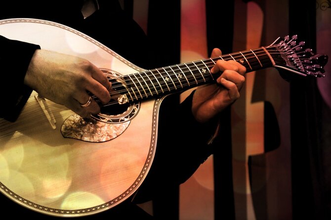 Semi Private Oporto Fado Show with Dinner - Ribeira dinner with fado between the courses