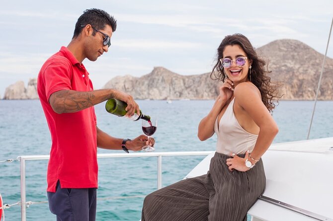 Sunset Cruise in Los Cabos with Jazz and Wine - Boarding the Tropicat at the Cabo marina