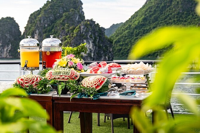 Symphony Luxury Cruise One Day Trip, Buffet Lunch (pool on top) - Luon Cave by kayak or rowing boat