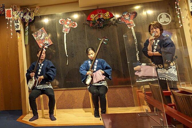 Tsugaru shamisen performance over traditional dinner - Key points at a glance