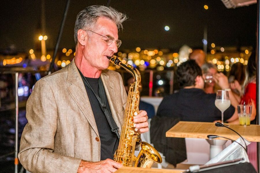 Venice: Catamaran Sunset Jazz Cruise with Aperitivo - The boat: open space, lounging beds, and practical comforts