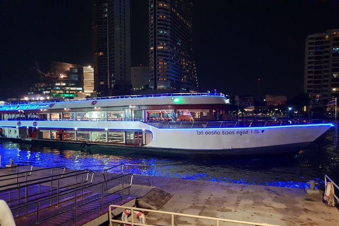 White Orchid Dinner Cruise from Bangkok with Pickup & Live Music - Boarding the White Orchid at Si Phraya